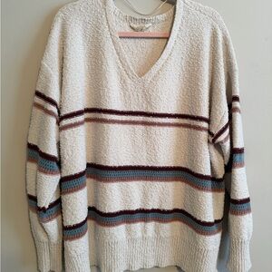 Elegant V-Neck Striped Sweater popcorn texture. Lays nice nurture